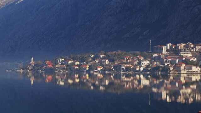 Balkan old town sunset, view historic city Montenegro, Croatia, UNESCO World Heritage site, famous tourist attraction in the Mediterranean. High quality 4k footage from 6k 12 bit raw cinematic camera