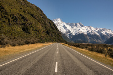 Mount Cook road heading to the snow capped alps in the Aoraki Mt Cook National Park