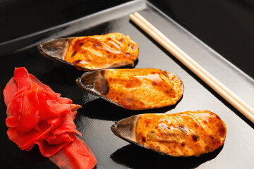 Baked Mussels with Spicy Mayo on Black Plate