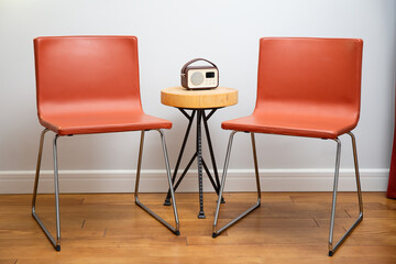 Retro Red Chairs and Wooden Table with Vintage Radio