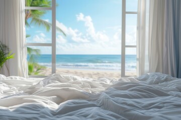 White messy bedding and big window with view to beautiful sea. 