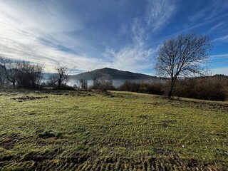 autumn hilly landscape with fog