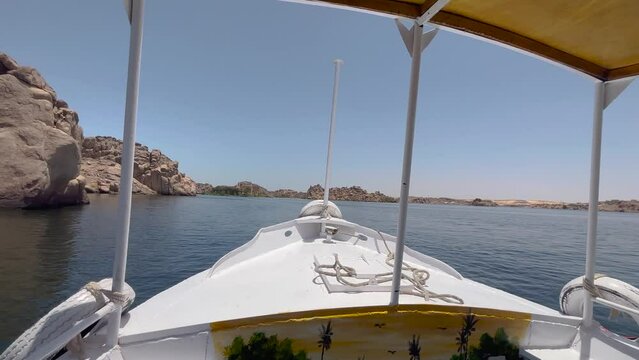 Road by boat on the river nile in Aswan Egypt