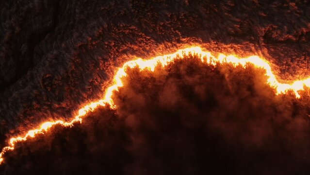 Aerial Night View of a Field on Fire