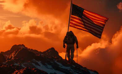 a hiker walking up a mountain with an american flag at the top