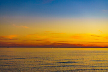 Fototapeta na wymiar Sky at sunset over sea