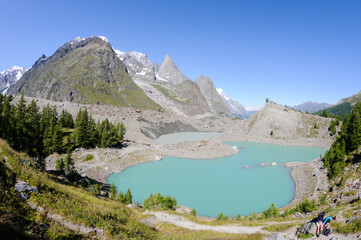 Naklejka na ściany i meble Glacial lake in the high Alpes