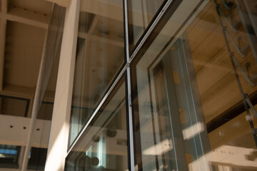 high efficiency window, frame and double glazing detail on building with continuous facades,...