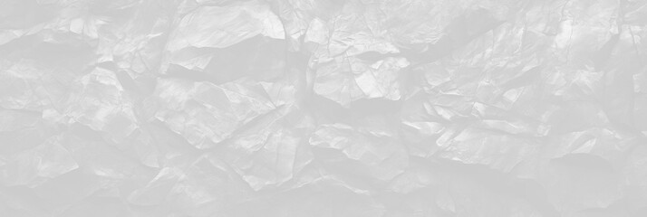 Panoramic white natural bold abstract rock background. Light stone texture mountain close-up cracked banner ad design copy space