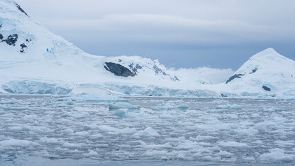Fototapeta na wymiar Glaciers on shore of Antarctic Peninsula. Ice snow. 