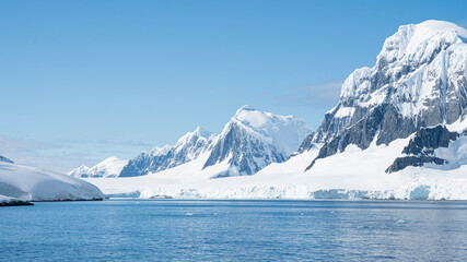 Antarctica mountains and sea. South Pole. On a sunny day. 