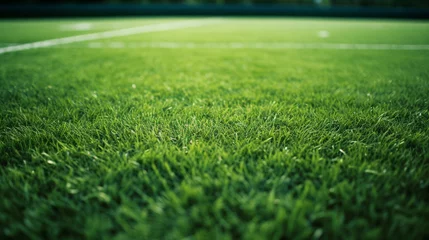 Schilderijen op glas green grass football field close up © piggu