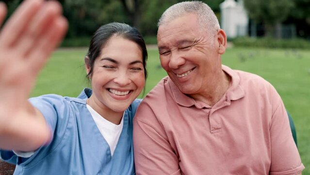 Face, selfie and nurse with senior man on park bench for health, rehabilitation or support. Portrait, caregiver and happy patient at garden outdoor for retirement, picture or photo together in nature