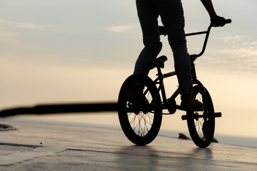 Fototapeta premium Freestyle cyclist practicing street BMX