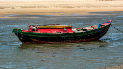 An artisanal, rustic, wooden and traditional fishing boat from the state of Maranhão, Brazil.