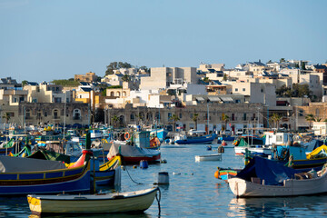 Fototapeta na wymiar Colorful Marsaxlokk Harbour - Malta
