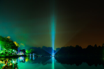 Light beam in the lake at night