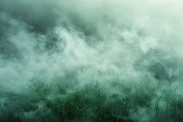 Fototapeta premium Whisps of mist weave through the verdant blades of grass, crafting a scene of ethereal beauty and tranquil mystery.