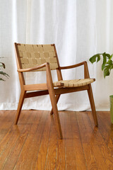 Vintage teak armchair with soft jute webbing. Mid-Cenutry Modern accent lounge chair. Home interior...