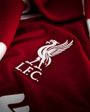 Liverpool FC logo emblem Home Football Soccer Shirt for the season. logo detail and performance Vaporknit with red and white LFC scarf detail. Landscape. Liverpool, Merseyside, UK 2023. Portrait Klopp