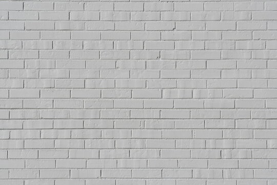 Brick wall painted white.