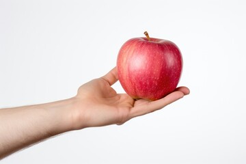 a apple on a hand