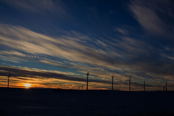 Wind turbines at sunset on the Buffalo Ridge © Peter