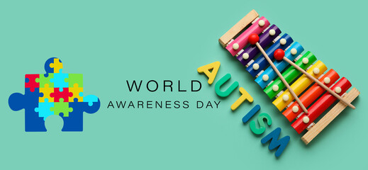 Xylophone and text WORLD AUTISM AWARENESS DAY on green background