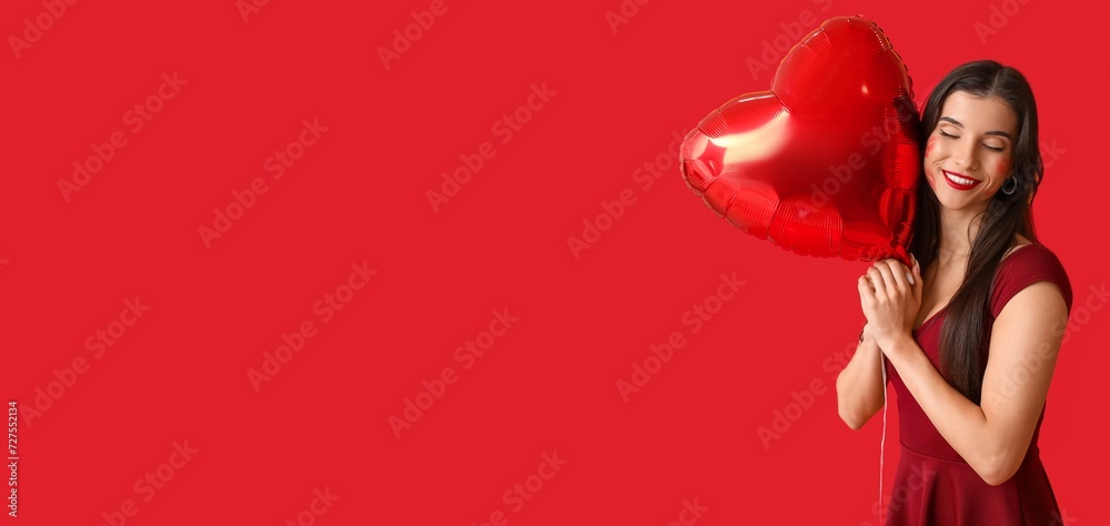 Sticker Beautiful young woman with kiss marks on her face and heart shaped air balloon on red background with space for text