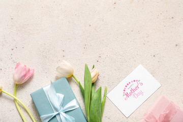 Card with text HAPPY MOTHER'S DAY, gift boxes and tulip flowers on light background