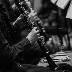 Hands musician playing the clarinet in black and white