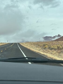 low lying clouds in northwest arizona road near the Grand Canyon