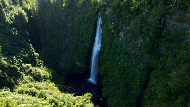 Bird's eye view of the Tocoihue waterfall on a sunny day, natural and touristic environment of Chiloé, southern Chile.