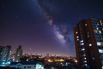 the milky way on the night sky city