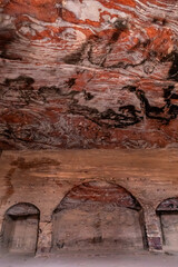 Whimsical natural color patterns on ceiling of room in the Great Temple in the Nabatean Kingdom of Petra in Wadi Musa city in Jordan