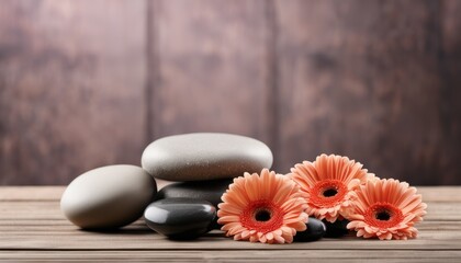A pile of rocks and flowers on a wooden table