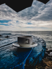 Tea cup on a table in sea side