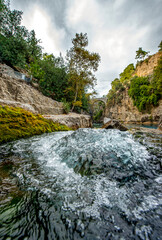 Transparent waters of Kopru River (Köprüçay, ancient Eurymedon) with its emerald green colour in Koprulu Canyon (Köprülü Kanyon) National Park, Antalya, Turkey. It's a rafting paradise