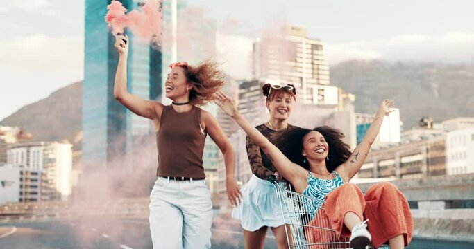 Friends, city and trolley for color smoke in fashion, street or road for outdoor freedom. Female person or group smile for fun holiday, weekend or celebration with signal, flare or ride in Cape Town