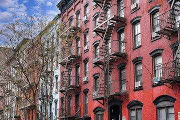New York City old fashioned apartment buildings with external fire ladders - 727588161