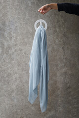 Flat Lay photo of plain pastel colored scarf fabric