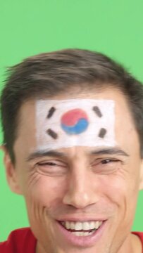 Close up of a man supporting south korean team