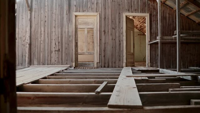 Unfinished wooden attic of a house.