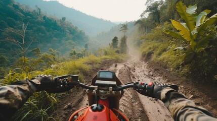 First-person view of riding a motorcycle on a muddy jungle path