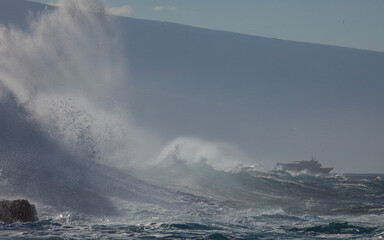 Incredibly powerful ocean waves crashing into the shore