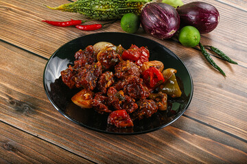 Asian cuisine - pork with chili sauce