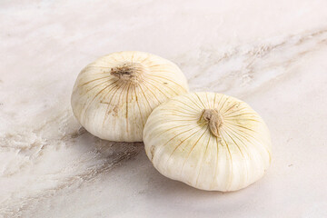 Raw white onion heap isolated