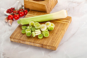 Ripe sliced leek over board