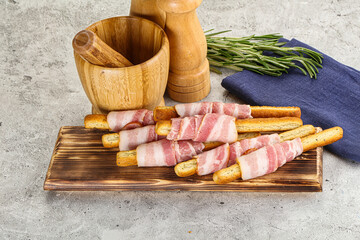 Crispy grissini italian bread with bacon