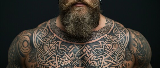 A powerful Viking warrior tattoo, with fierce facial expressions, displayed on the chest, symbolizing bravery and resilience, against a solid charcoal background.